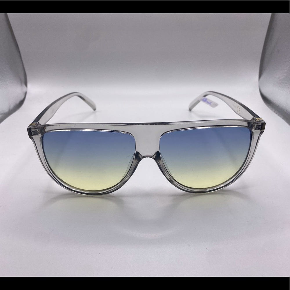 Woman’s large blue sunglasses